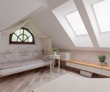 Sunny room in the attic in romantic style
